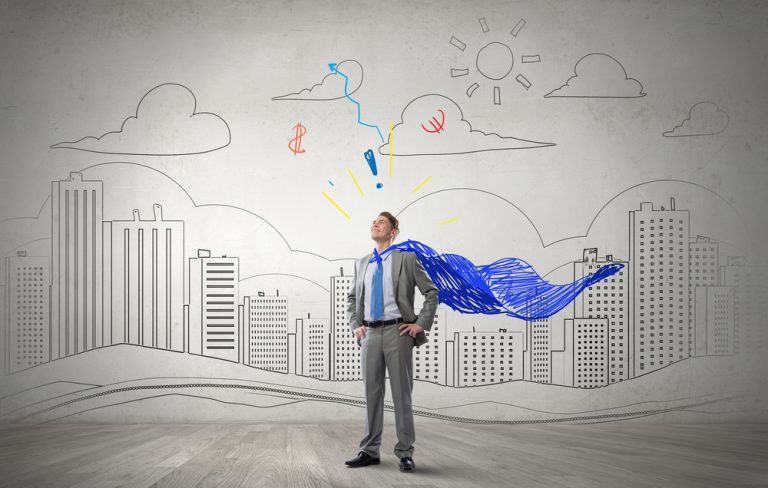 Young confident super businessman with cape behind back